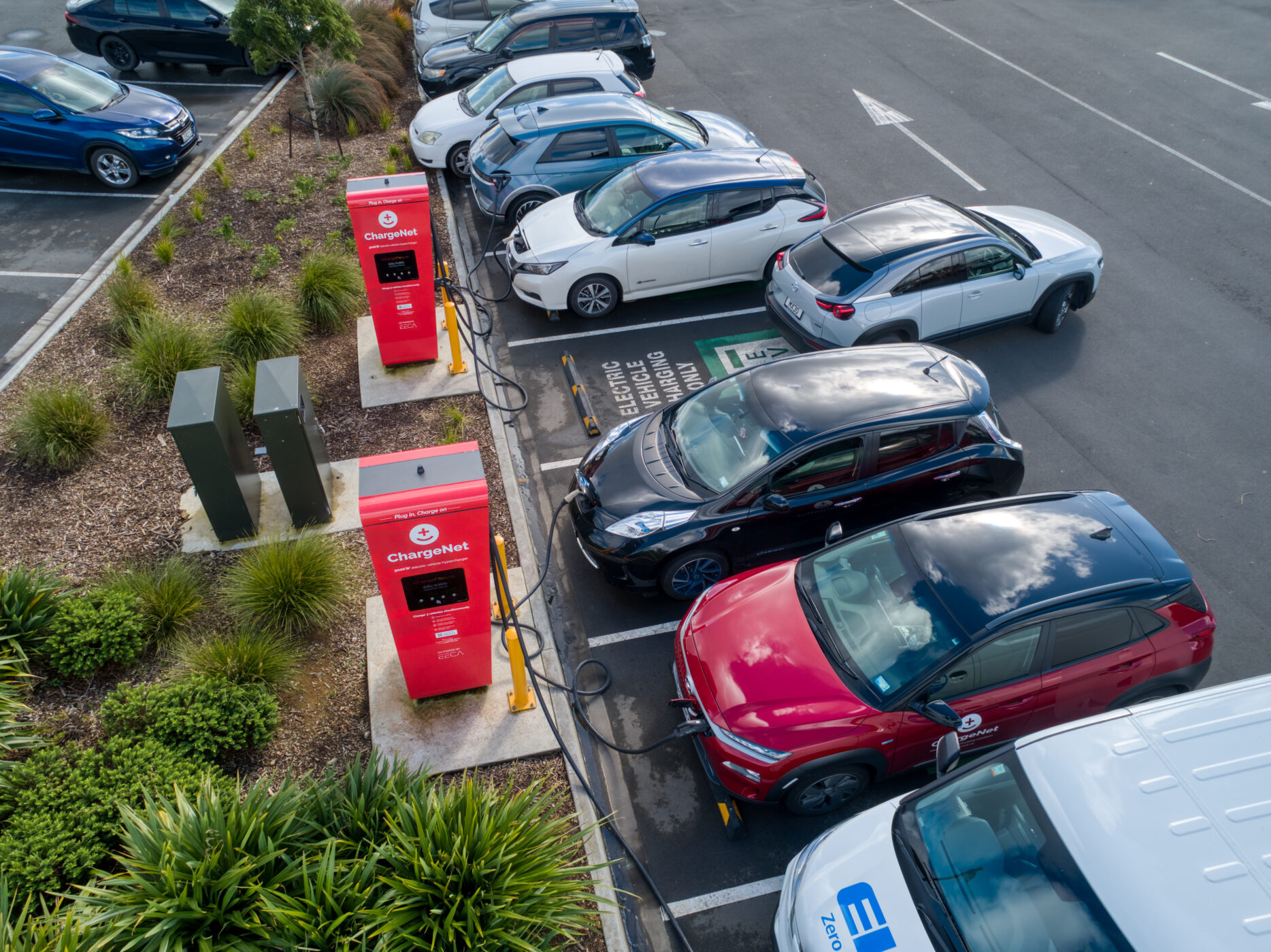 Aerial view of electric vehicles charging at ChargeNet chargers